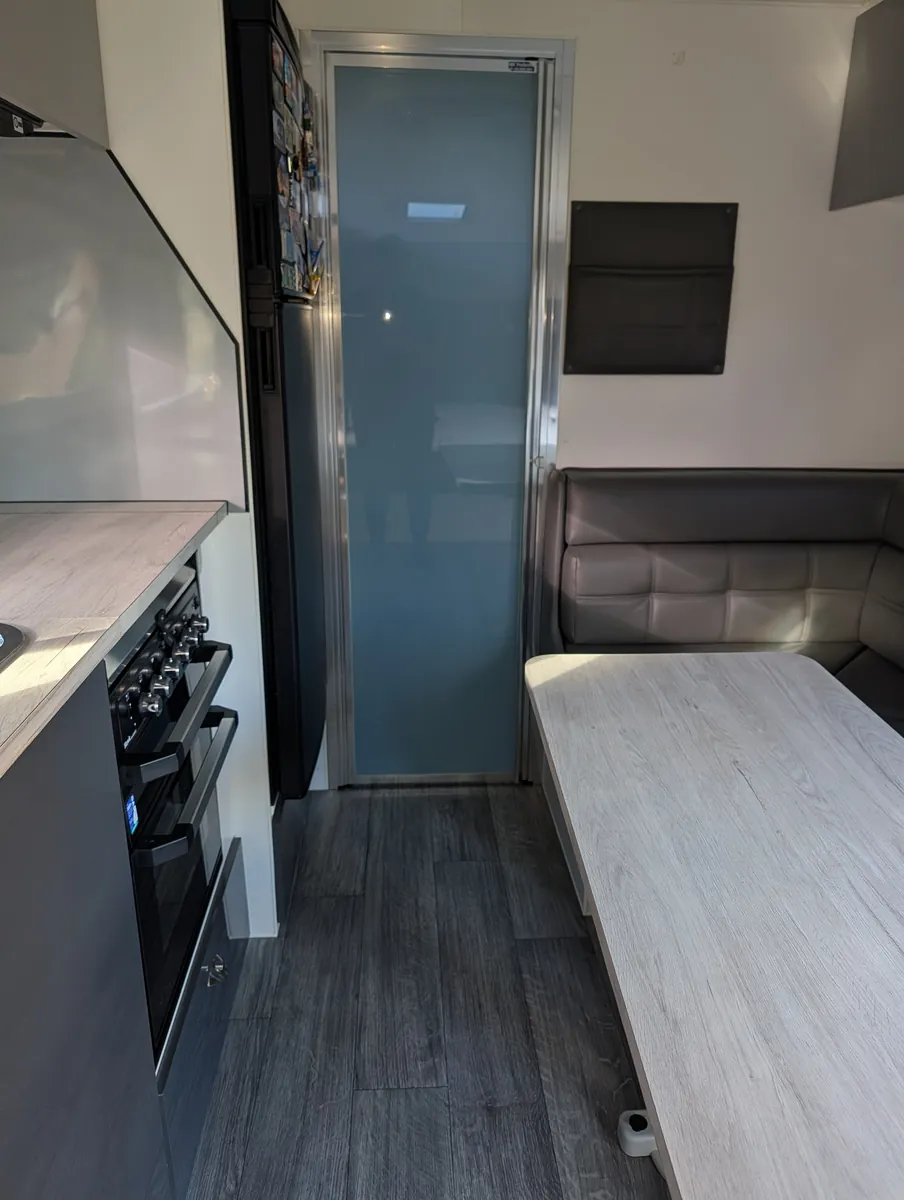 Floor, kitchen and ensuite: caravan interior detail in Perth by Mobile Masters Detailing