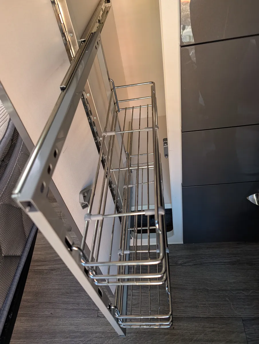 Pull-out pantry: caravan interior detail in Perth by Mobile Masters Detailing
